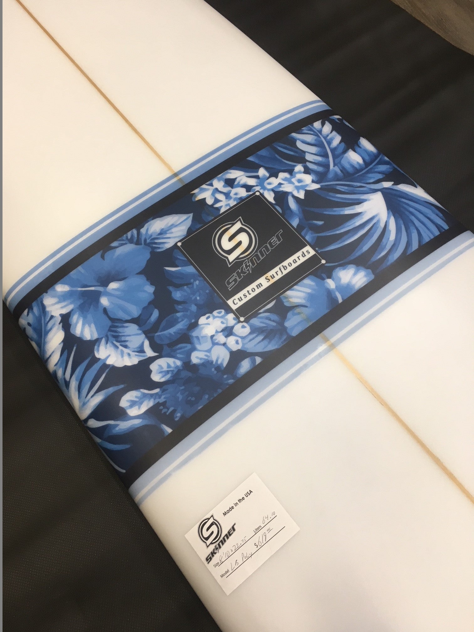 SOLD Skinner 8'10 X 22.7 X 2.8" Poly Longboard Floral Band 64 Liters Surfboard